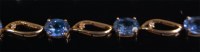 Lot 1290 - A ladies 10ct gold Ceylon sapphire and diamond...