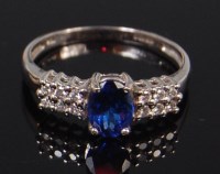 Lot 1296 - A modern ladies 18ct white gold tanzanite and...