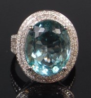 Lot 1307 - A contemporary 14ct white gold blue topaz and...