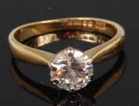 Lot 1309 - A modern ladies 18ct gold diamond solitaire...