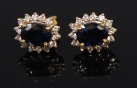 Lot 1315 - A pair of 18ct gold sapphire and diamond set...