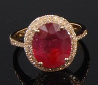 Lot 1317 - A 14ct yellow gold ruby and diamond dress ring,...