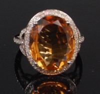 Lot 1319 - A contemporary 14ct white gold citrine and...