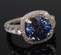 Lot 1325 - A Michael B platinum tanzanite and diamond...