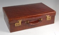 Lot 1348 - A gentlemans crocodile skin overnight case by...