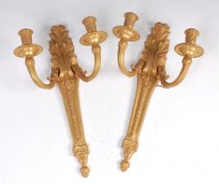 Lot 1360 - A pair of Louis XVI style gilt bronze twin...