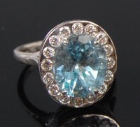 Lot 1305 - A ladies 18ct white gold aquamarine and...