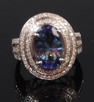 Lot 1318 - A contemporary 14ct white gold tanzanite and...