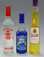 Lot 811 - Smirnoff vodka, 70cl, 37.5%; a Galliano...