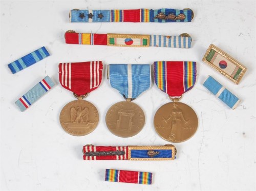 Lot 448 - A group of three American medals to include WW...