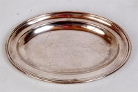 Lot 74 - A small oval shaped silver plate serving tray...