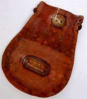 Lot 111 - Leather cash bag, 2 brass plates to either...