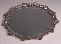 Lot 649 - A late Victorian silver salver, having a shell...