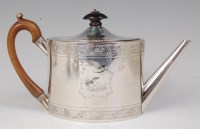 Lot 663 - A George III silver teapot, of oval form, with...