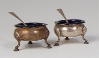 Lot 664 - A pair of George II silver table salts, each...