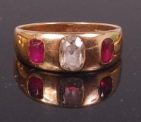 Lot 682 - An 18ct gold ruby and diamond dress ring, the...