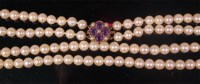 Lot 692 - A pearl double string necklace, having 9ct...