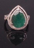 Lot 700 - A contemporary 14ct white gold emerald and...