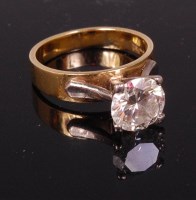 Lot 708 - A modern 18ct gold diamond solitaire ring, the...