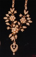 Lot 712 - An Edwardian 9ct gold and seed pearl set...