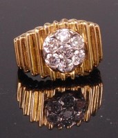 Lot 719 - An 18ct gold and diamond set ring by...