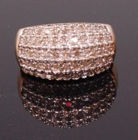 Lot 727 - A 14ct yellow gold and diamond set cocktail...