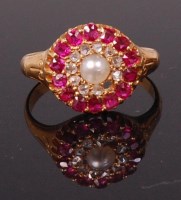 Lot 731 - An 18ct gold ruby, diamond and pearl cluster...