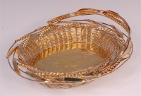 Lot 659 - A mid-Victorian gilded silver plate bread...