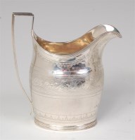 Lot 661 - A George III silver cream jug, of helmet form,...