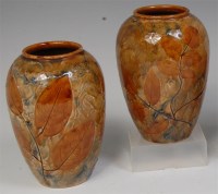 Lot 7 - A pair of Royal Doulton glazed stoneware vases,...