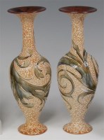 Lot 10 - A pair of Doulton Lambeth baluster form vases...