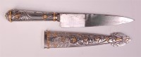 Lot 172 - An Argentinean silver and gold inset gaucho...