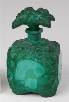 Lot 184 - A French Art Deco carved and polished...