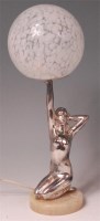Lot 204 - An Art Deco chrome table lamp in the form of a...