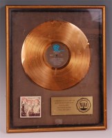 Lot 219 - The Who - Odds and Sods commemorative gold...