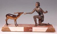 Lot 234 - A French Art Deco patinated spelter and...