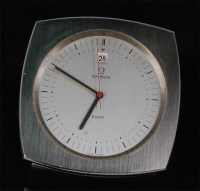 Lot 186 - A 1970s Omega brushed steel desk clock, having...