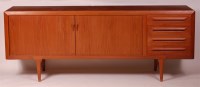 Lot 340 - A 1960s Danish teak long sideboard, having...