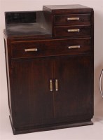 Lot 342 - An Art Deco oak compactum, having a stepped...