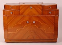 Lot 346 - An Art Deco figured walnut cocktail sideboard,...