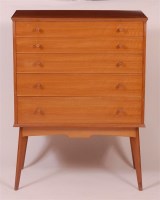 Lot 349 - A 1950s walnut squarefront chest, of five long...