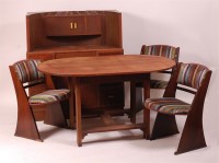 Lot 350 - An Art Deco oak three piece dining suite,...