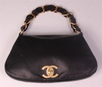 Lot 248 - A Chanel soft black leather handbag, with gilt...