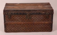 Lot 333 - A small Louis Vuitton travelling trunk, having...