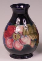Lot 27 - A Moorcroft Anemone pattern pottery vase, of...
