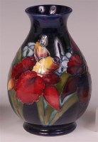 Lot 36 - A Moorcroft Anemone pattern pottery vase, of...