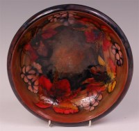 Lot 65 - A Moorcroft flambé Clematis pattern fruit bowl,...