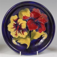 Lot 67 - A Moorcroft Anemone pattern pottery plate, of...