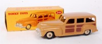 Lot 1931 - Dinky Toys, 344 estate car, brown body with...