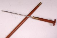 Lot 252 - A late 19th century sword stick, the hardwood...